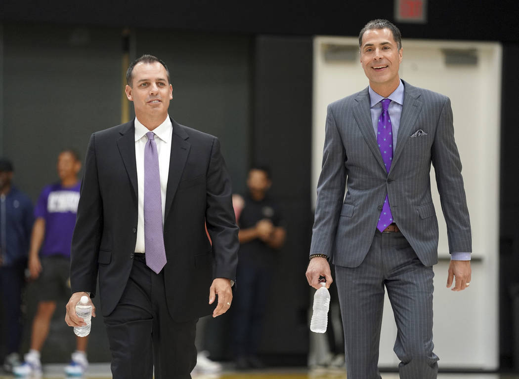New Los Angeles Lakers NBA basketball team head coach Frank Vogel, left, and general manager Ro ...