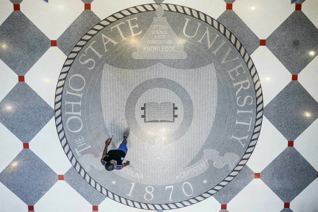 Pedestrians pass through The Ohio State University's student union, Saturday, May 18, 2019, in ...