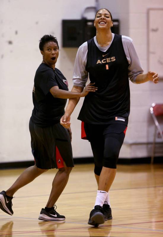 Aces center Liz Cambage with assistant coach Vickie Johnson during practice at the Cox Pavilion ...