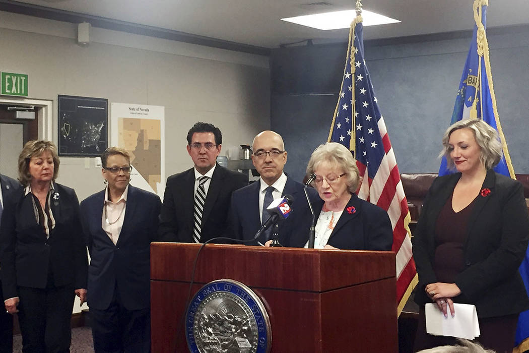 Nevada state Sen. Joyce Woodhouse, D-Henderson, at podium, speaks at a news conference about a ...