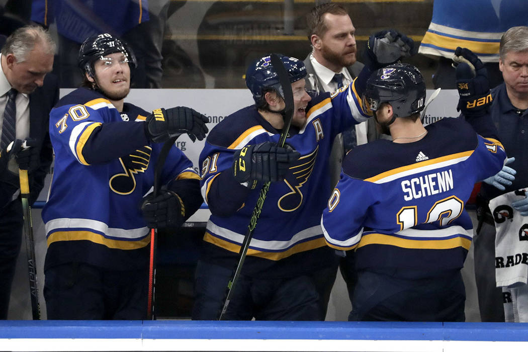 St. Louis Bluesplayers Oskar Sundqvist (70), of Sweden; Vladimir Tarasenko (91), of Russia; and ...