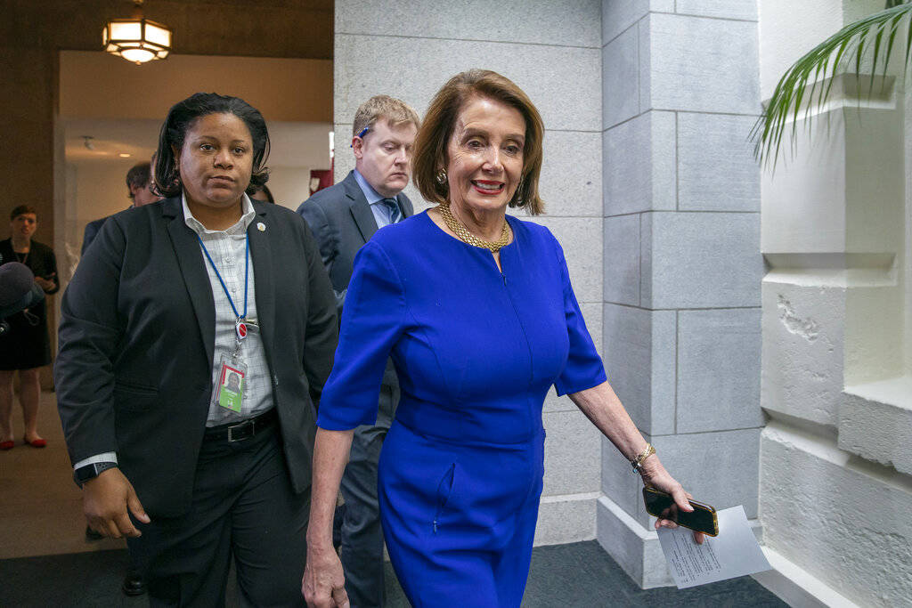 Speaker of the House Nancy Pelosi, D-Calif., arrives to meet with all the House Democrats, many ...