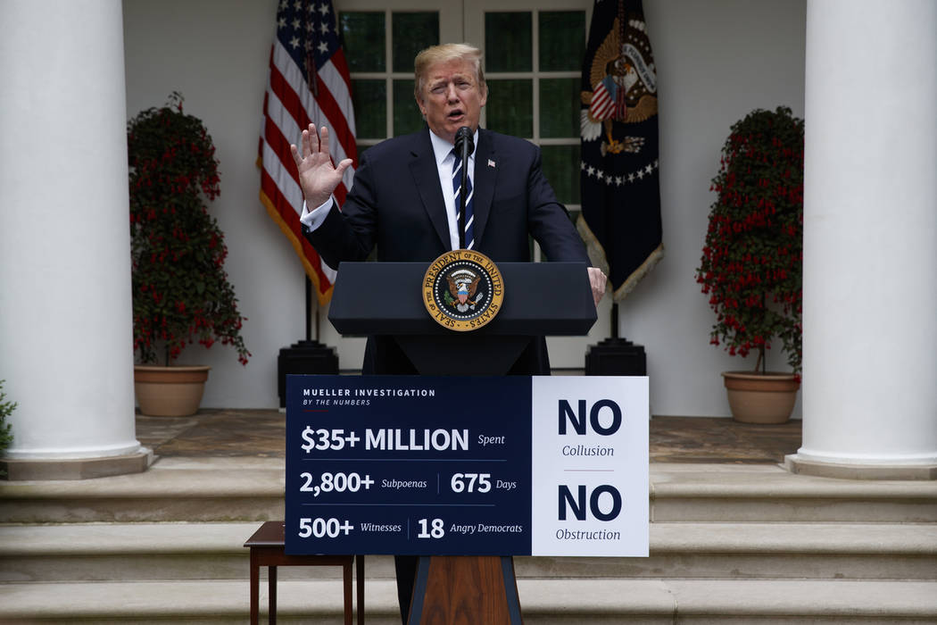 President Donald Trump delivers a statement in the Rose Garden of the White House, Wednesday, M ...