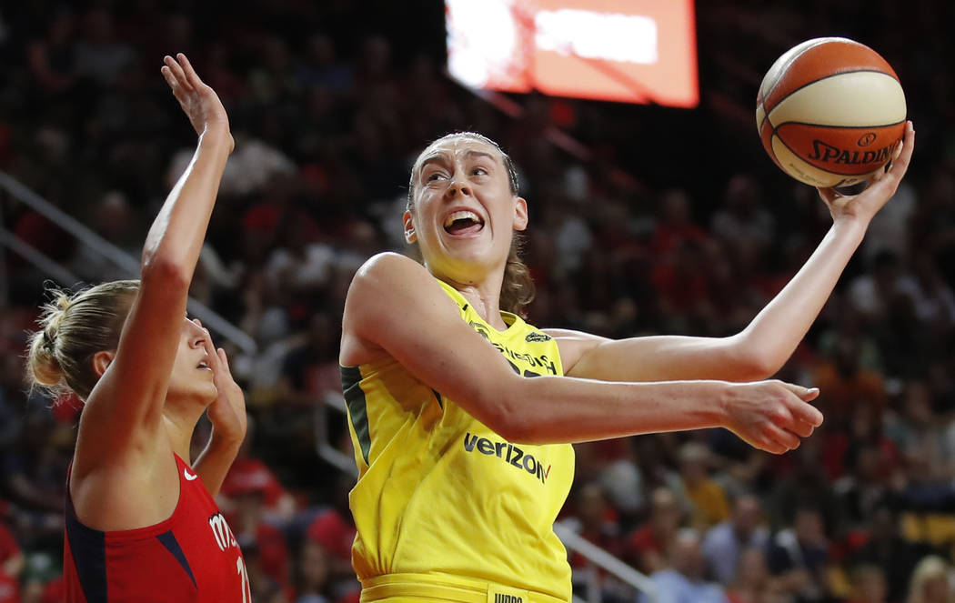 Seattle Storm forward Breanna Stewart (30) shoots as Washington Mystics forward Elena Delle Don ...