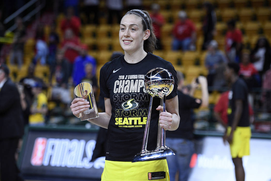 Seattle Storm forward Breanna Stewart poses with the finals mvp trophy and the WNBA championshi ...