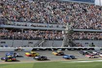 In a Feb. 17, 2019, file photo, William Byron (24) and Alex Bowman (88) lead the field to start ...