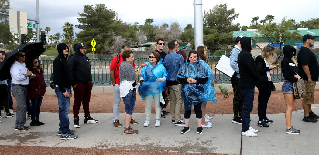 People line up to take photos at the Welcome to Fabulous Las Vegas sign on the Strip Wednesday, ...