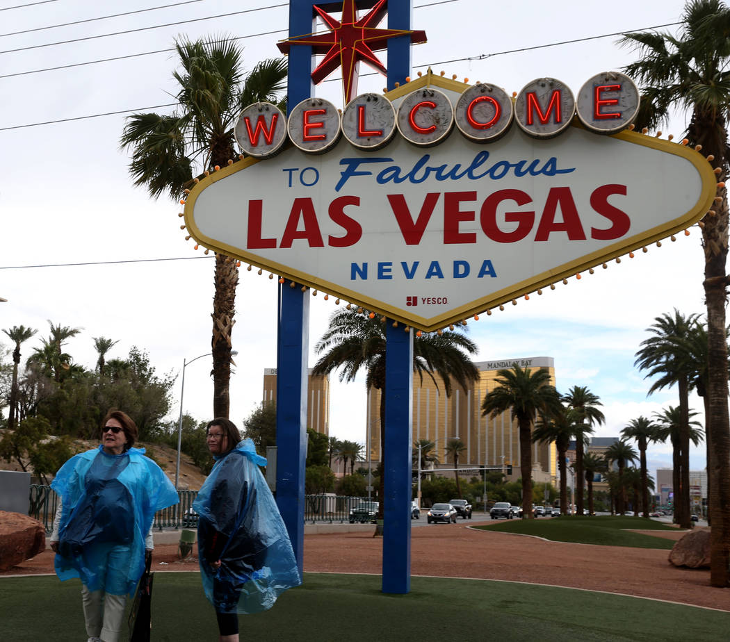 Monique Charland, 74, left, and her daughter Dominique Forget, 49, of Canada get their photo ta ...