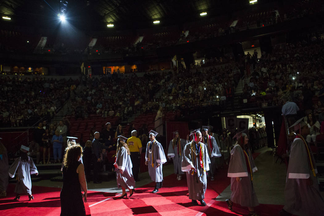 Graduating Coronado High School valedictorians walk during the processional at their graduation ...