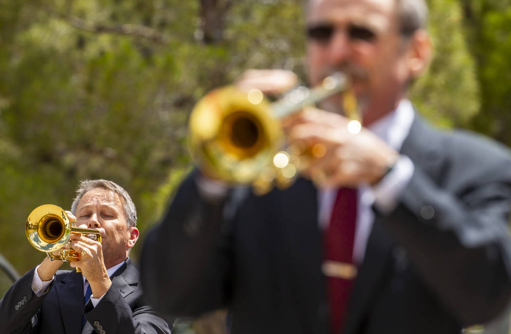 The Trumpeters Alliance perform Taps ending a Memorial Day ceremony at the Southern Nevada Vete ...