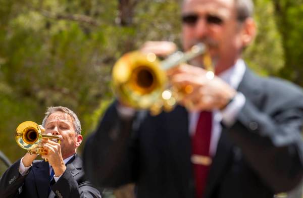 The Trumpeters Alliance perform Taps ending a Memorial Day ceremony at the Southern Nevada Vete ...