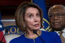 Speaker of the House Nancy Pelosi, D-Calif., joined at right by Majority Whip James E. Clyburn, ...