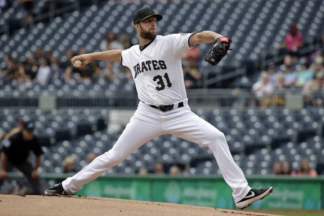 Pittsburgh Pirates relief pitcher Jordan Lyles delivers in the first inning of the team's baseb ...