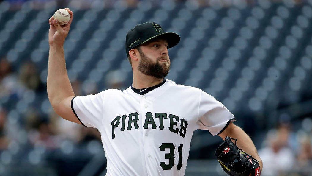Pittsburgh Pirates relief pitcher Jordan Lyles delivers in the first inning of the team's baseb ...
