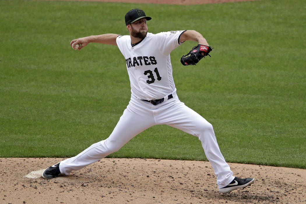 Pittsburgh Pirates starting pitcher Jordan Lyles delivers in the sixth inning of a baseball gam ...