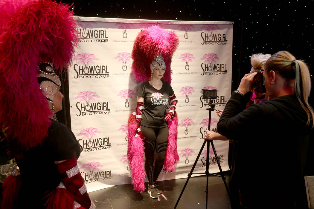 Jacqueline Hill of Henderson gets her photo taken during a preview of Showgirl Bootcamp at Saxe ...