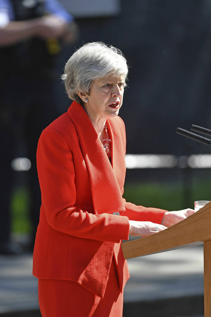 Britain's Prime Minister Theresa May makes a statement outside at 10 Downing Street in London, ...