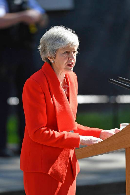 Britain's Prime Minister Theresa May makes a statement outside at 10 Downing Street in London, ...