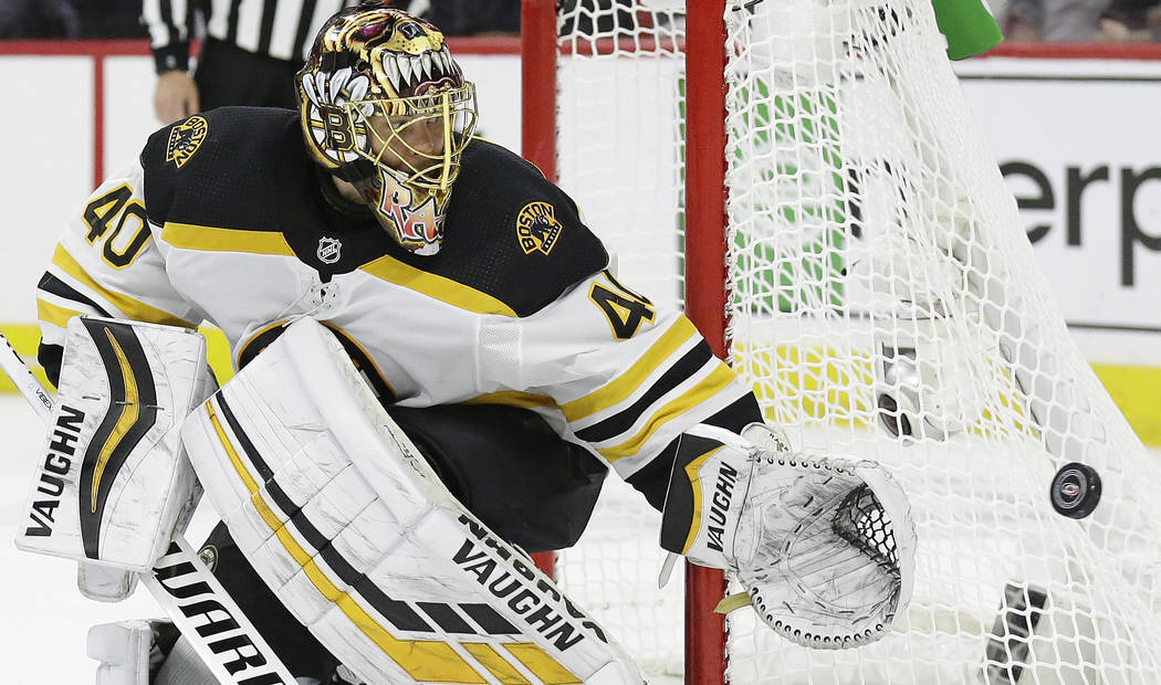 Boston Bruins goalie Tuukka Rask (40), of Finland, defends the goal against the Carolina Hurric ...