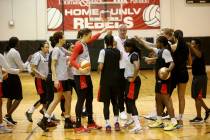 Aces coach Bill Laimbeer gathers his players during practice at Cox Pavilion in Las Vegas Wedne ...