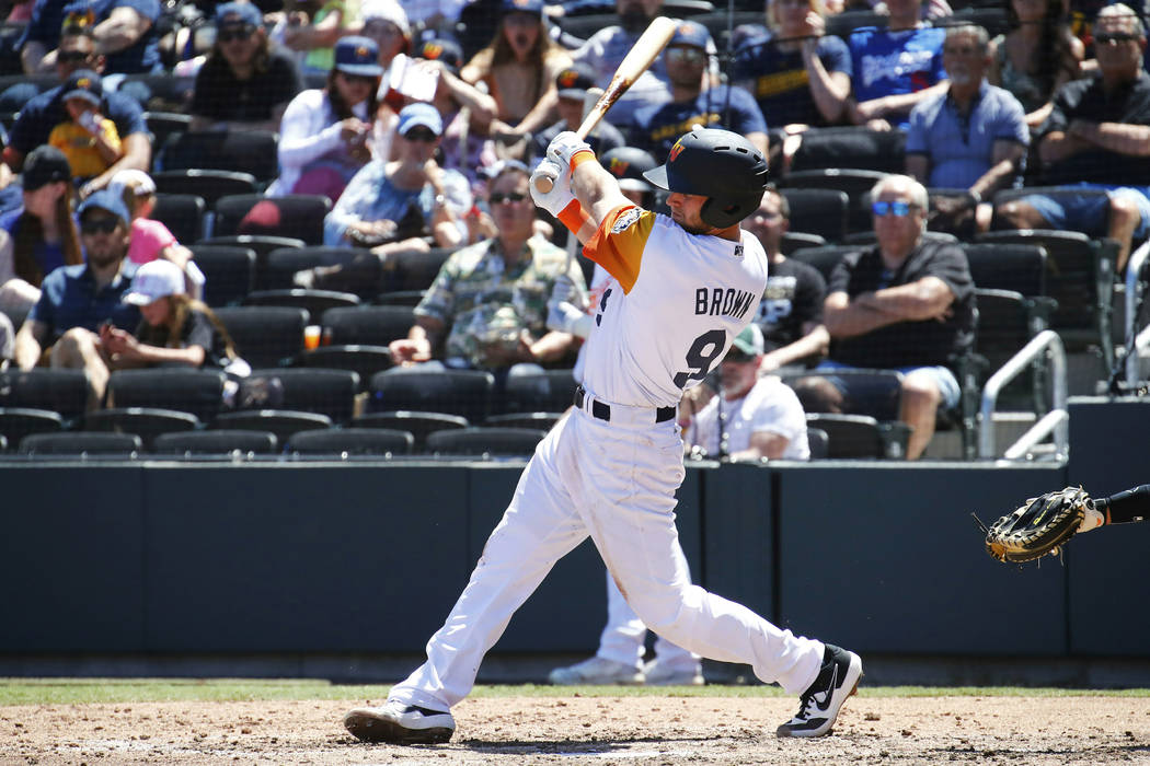 Seth Brown (9) of the Las Vegas Aviators swings for a hit during a regular season game between ...