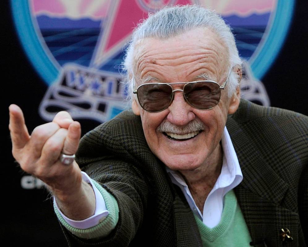 In this Jan. 4, 2011 file photo, Comic book creator Stan Lee strikes the Spiderman pose as he p ...