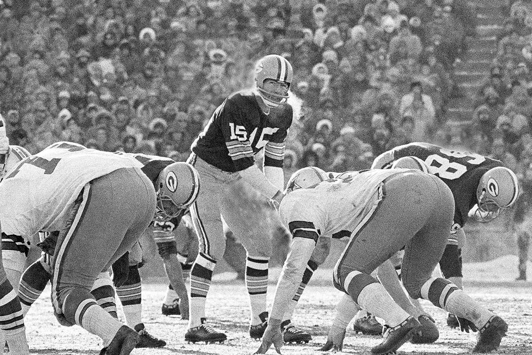 FILE - In this Dec. 31, 1967, file photo, Green Bay Packers quarterback Bart Starr calls signal ...