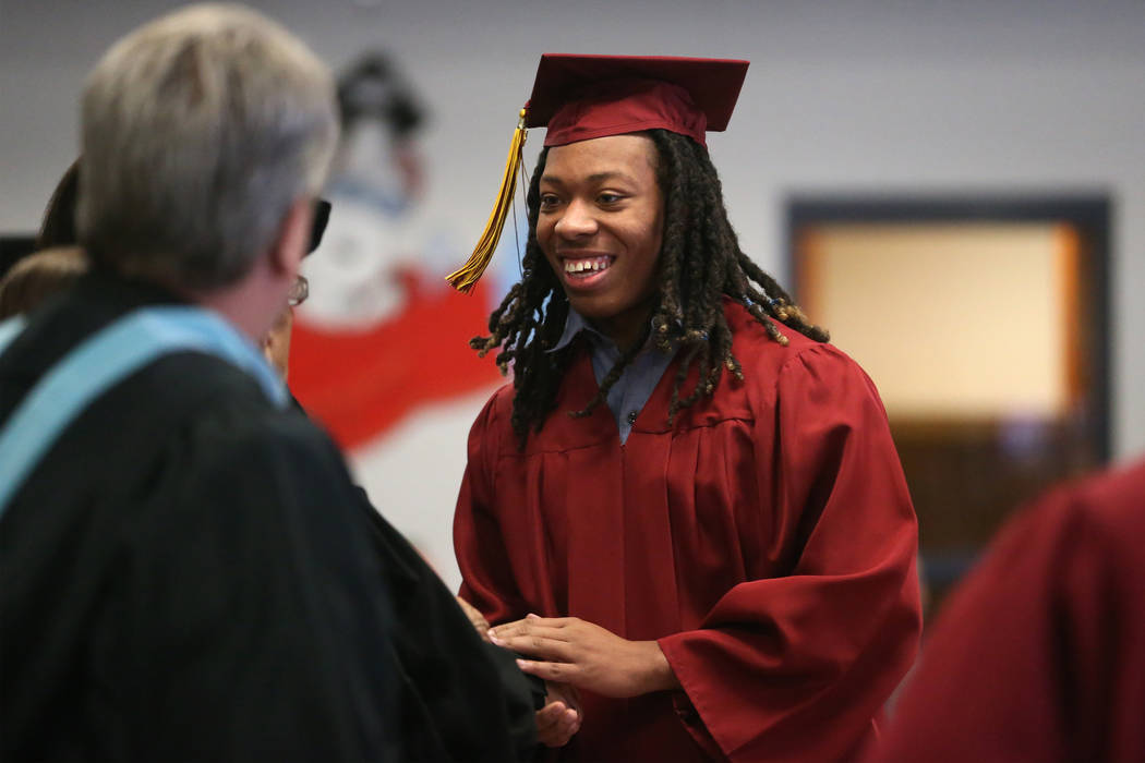 Inmate Trayvon Ward, 19, a former high school football standout from Las Vegas, graduates with ...