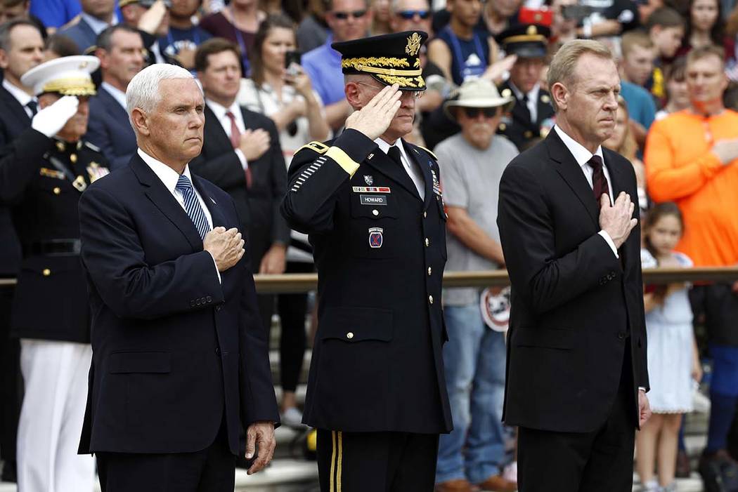 Vice President Mike Pence, from left, U.S. Army Maj. Gen. Michael Howard and Acting Defense Sec ...