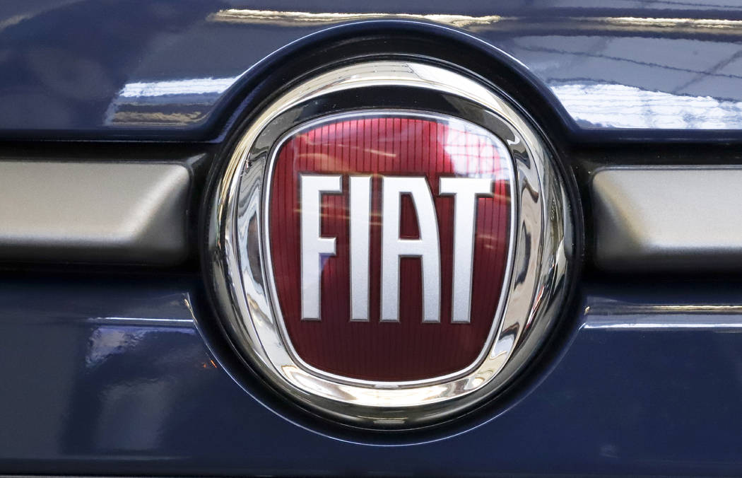FILE - In this Feb. 14, 2019, file photo, this is the Fiat logo is mounted on a 2019 500 L on d ...