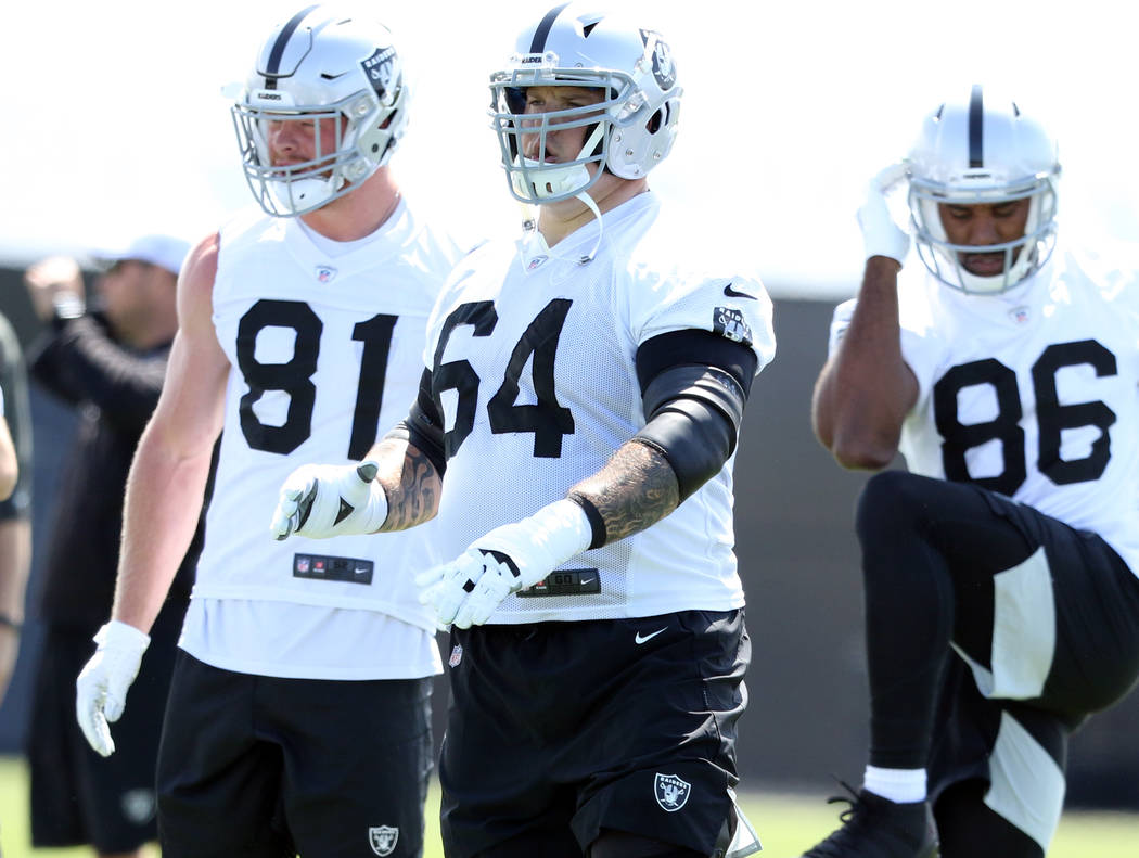 Oakland Raiders tight end Paul Butler (81), offensive guard Richie Incognito (64) and tight end ...