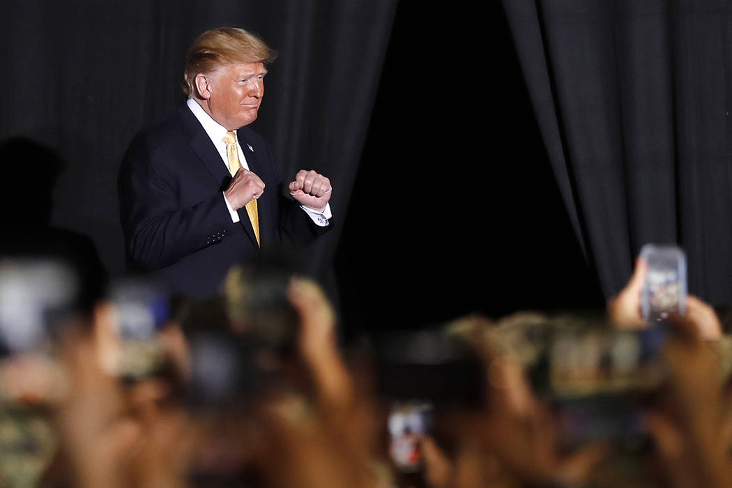 U.S. President Donald Trump greets U.S. servicemen at U.S. Navy multipurpose amphibious assault ...