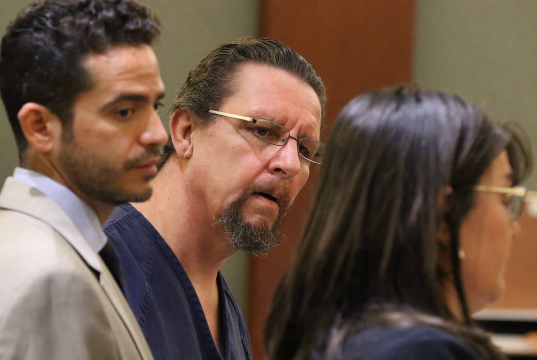 Christopher Sena, center, convicted of videotaping sex acts with children, appears in court dur ...