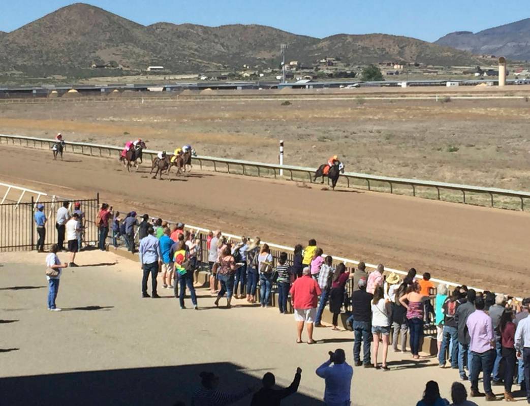 Horses race down the track at Arizona Downs in Prescott Valley, AZ, May 25, 2019. (Mike Brunker ...