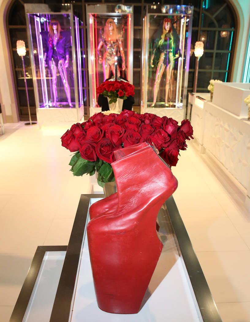 Custom boots, dresses and accessories worn by Lady Gaga are displayed at Haus of Gaga store dur ...