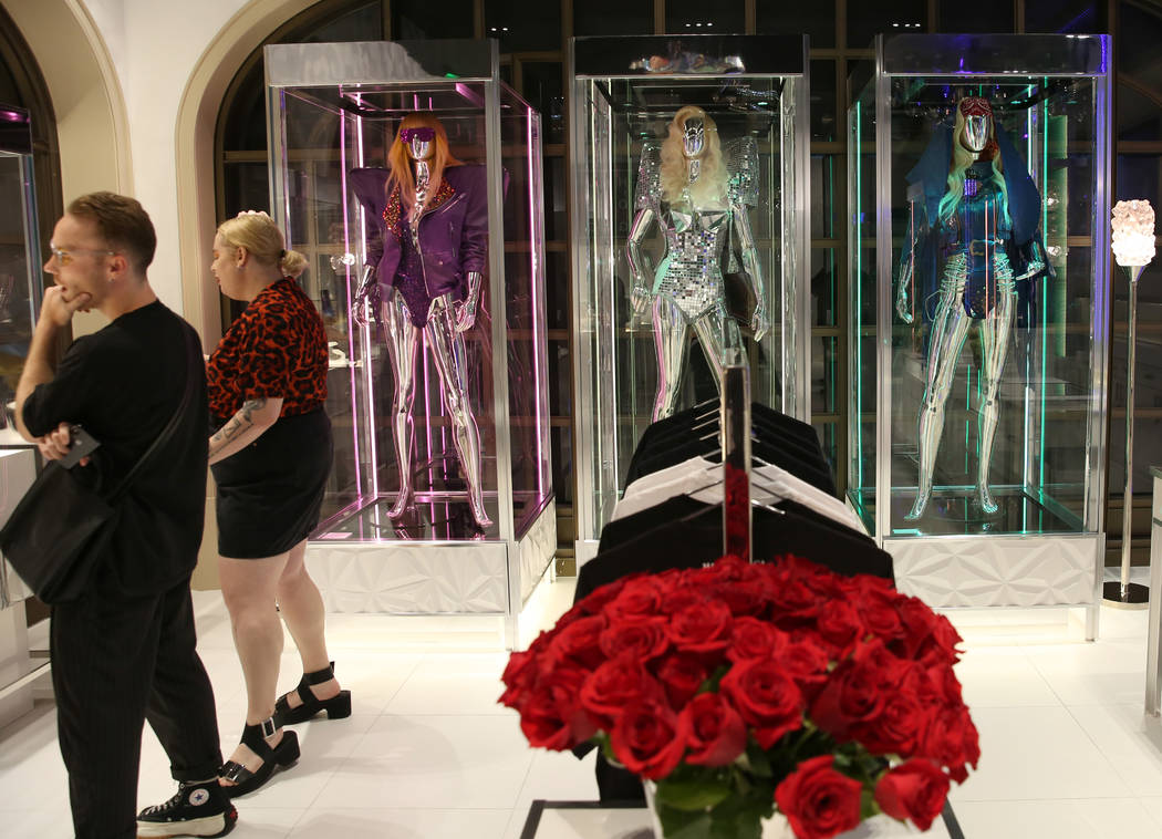 Custom dresses worn by Lady Gaga are displayed at Haus of Gaga store during a media preview on ...
