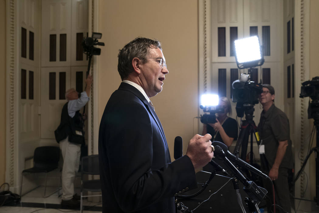 Rep. Thomas Massie, R-Ky., speaks to reporters at the Capitol after he blocked a unanimous cons ...