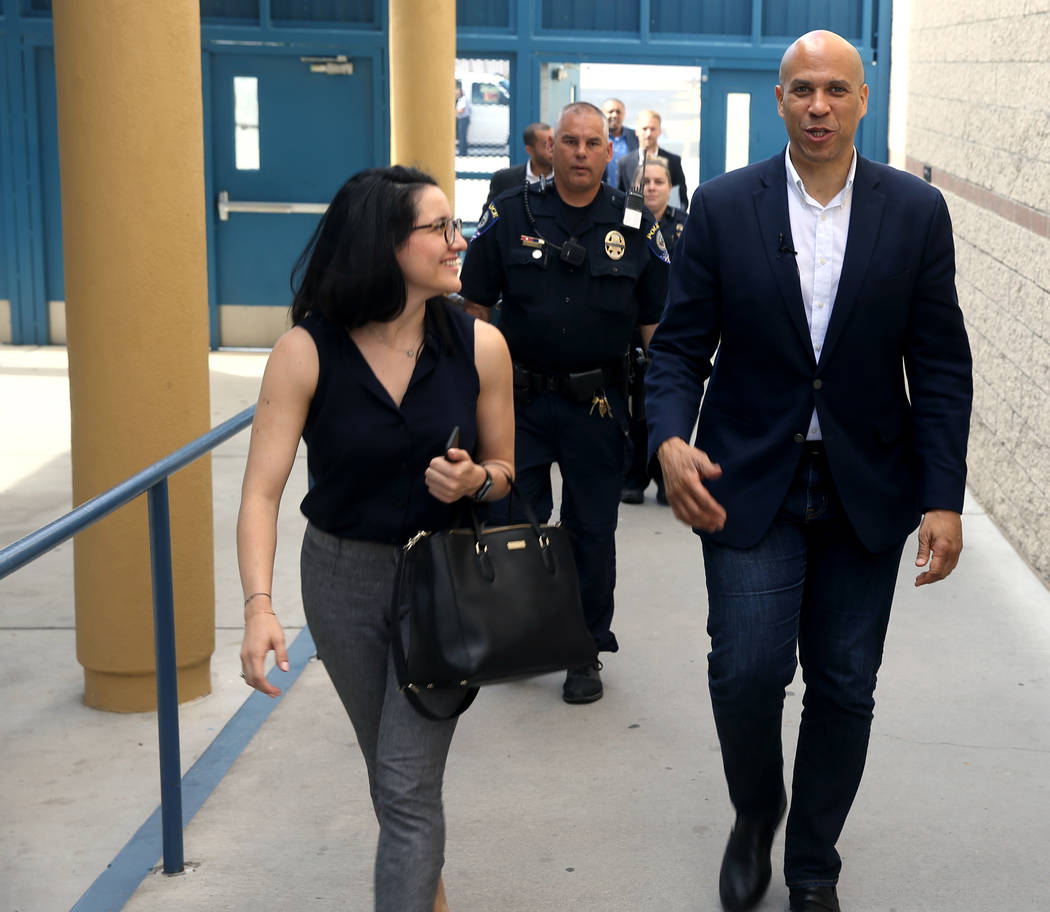 Presidential hopeful Sen. Cory Booker, D-N.J., arrives with Vanessa Valdivia for Student Conv ...