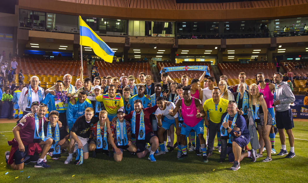 Las Vegas Lights FC goalkeeper Thomas Olsen (1) stands for a group photo with visiting IFC Sub ...