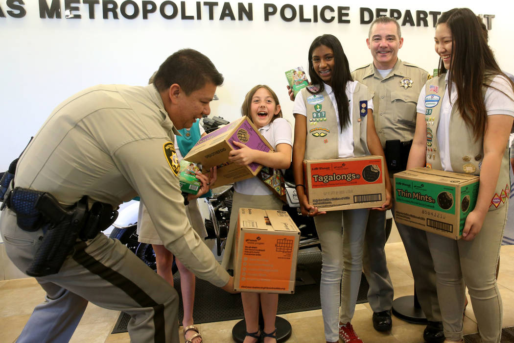 Girl Scouts of Southern Nevada, from left, Kendall Tiffany, 11, Juliette Hoffman, 9, Lily-Renee ...