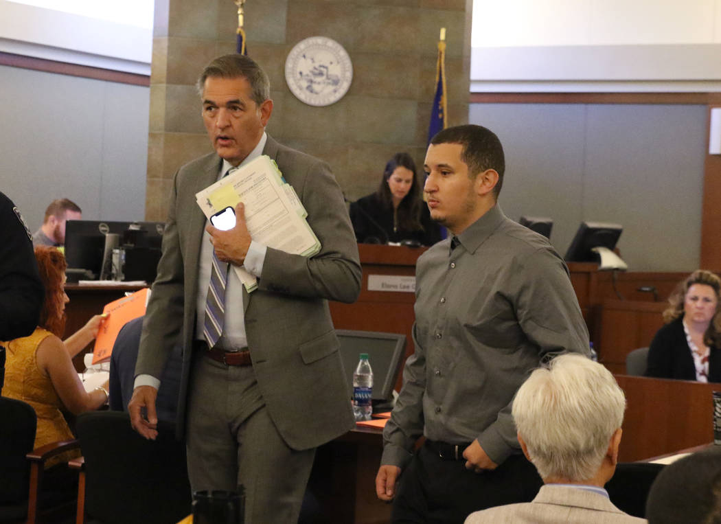 Ryan Mansour, right, charged with attempted murder for driving over his girlfriend after she at ...