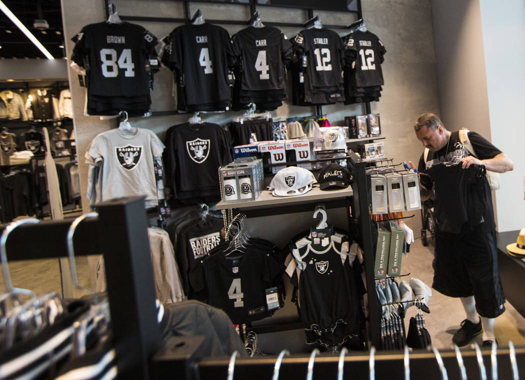 Nickolaus Gerencser, of Baldwin Park, Calif., shops at The Raider Image store at the Galleria a ...