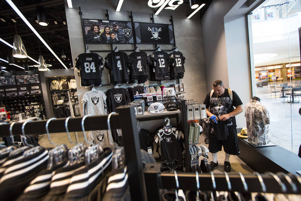 Nickolaus Gerencser, of Baldwin Park, Calif., shops at The Raider Image store at the Galleria a ...