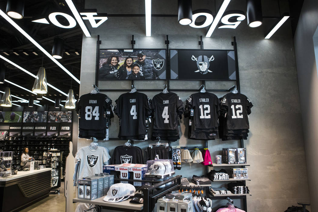 A variety of Raiders apparel at The Raider Image store at the Galleria at Sunset mall in Hender ...