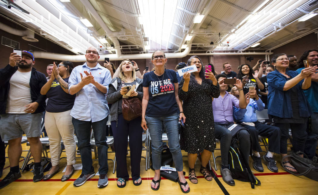 Supporters cheer as Democratic presidential candidate Sen. Bernie Sanders, I-Vt., arrives to sp ...