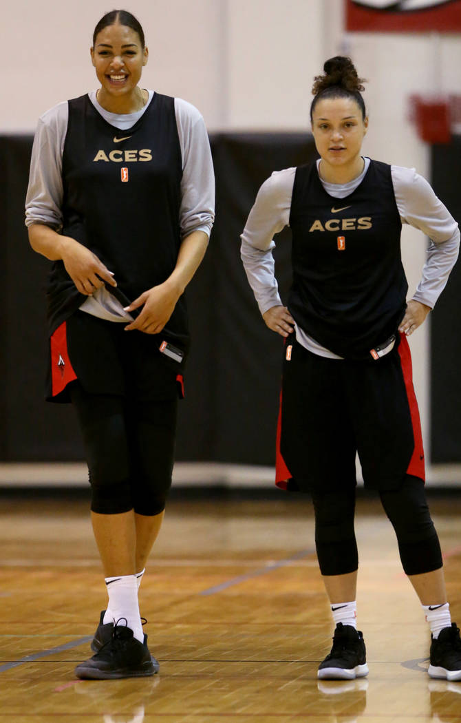 Aces center Liz Cambage, left, with guard Kayla McBride during practice at the Cox Pavilion in ...
