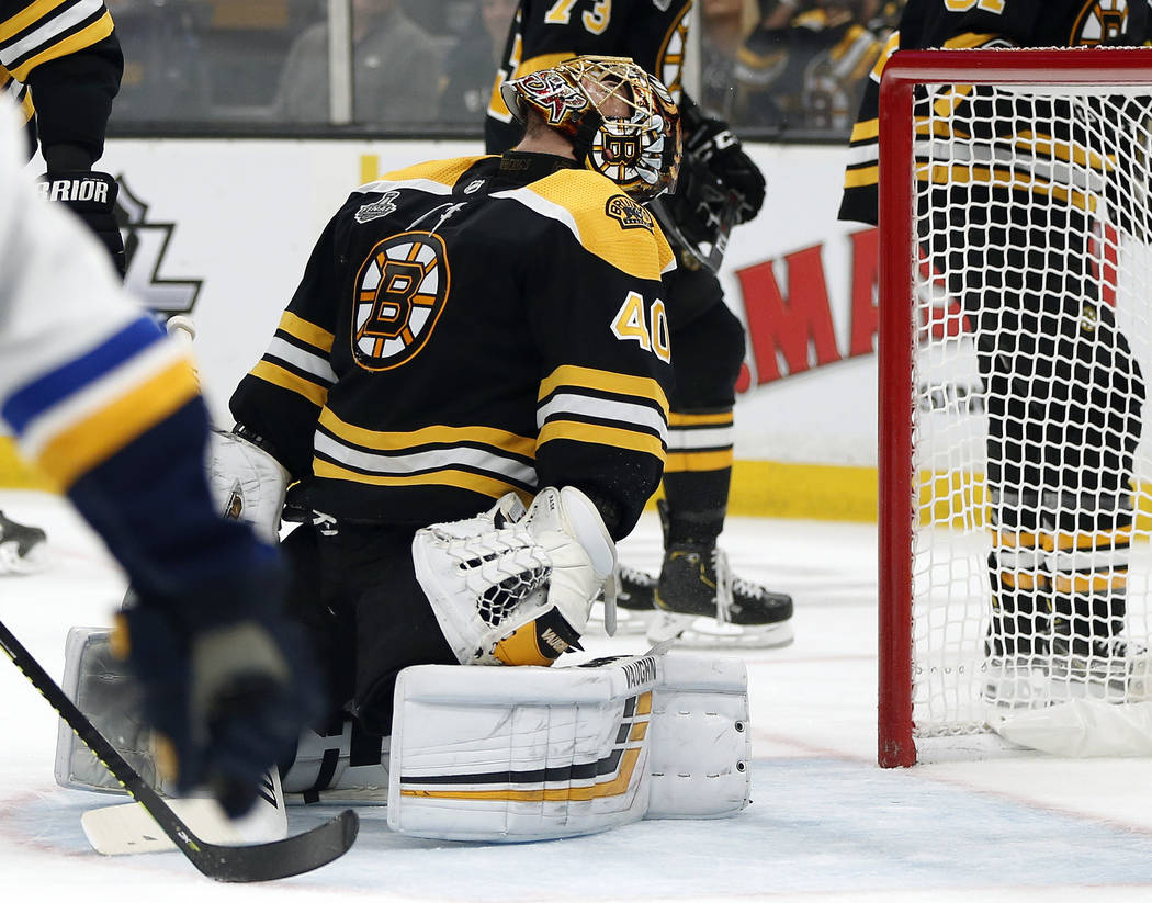 Boston Bruins goaltender Tuukka Rask, of Finland, reacts after allowing a goal by St. Louis Blu ...