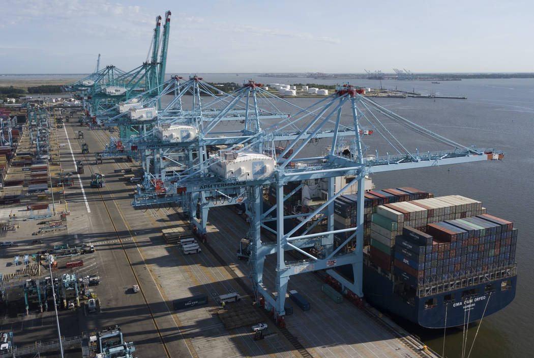 A container ship is unloaded May 10, 2019, at the Virginia International Gateway terminal in No ...
