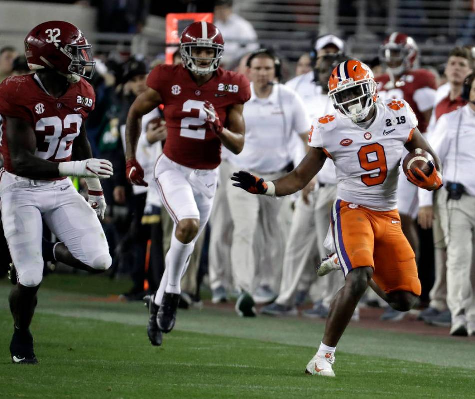 Clemson's Travis Etienne runs during the second half of the NCAA college football playoff champ ...
