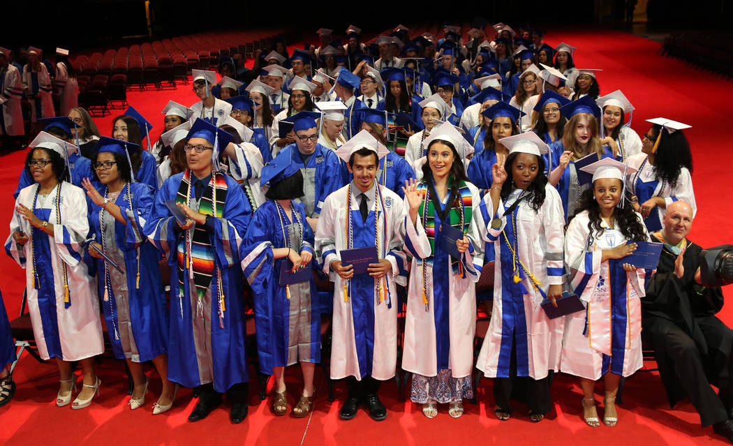 College of Southern Nevada High School students react at the end of their graduation ceremony a ...